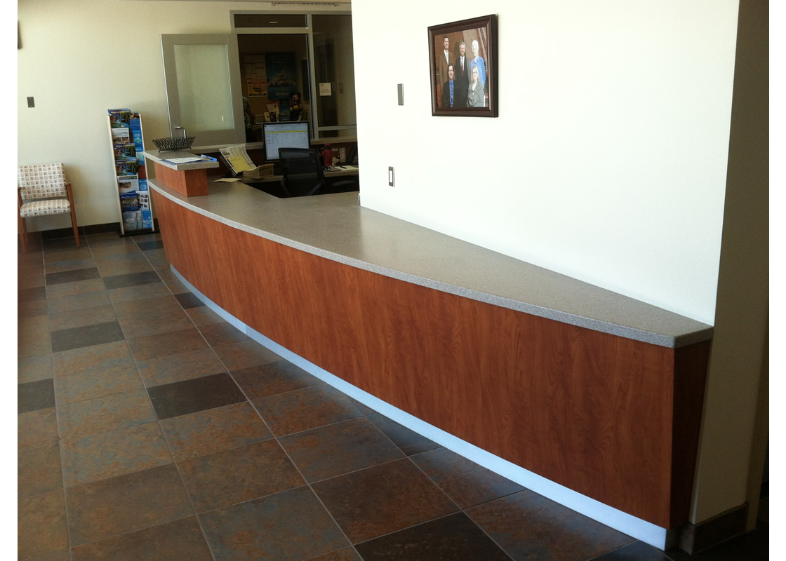 A view of how the desk extends and slopes into the wall.